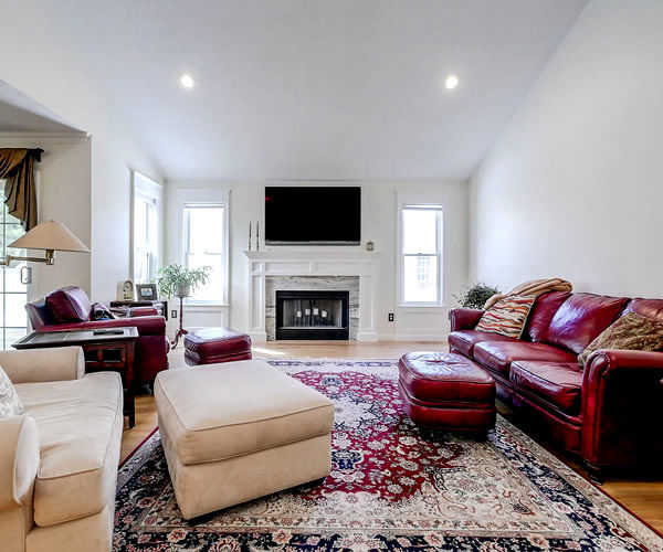 Cabinetry by SM Hall - New Hampshire indoor fireplace design