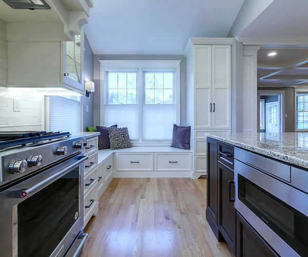 Cabinetry by SM Hall - Classic Traditional New England Kitchen and Bath - Classic Traditional New England Details, Custom Fireplace Built-in, Window Bench, Custom Coffered Ceiling