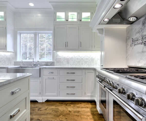 Cabinetry by SM Hall - Traditional Style Kitchen and Bath -Traditional Style, Transitional Style, White Cabinets, Glamorous, curved mullions, custom mosaic tile backsplash, custom hidden storage cabinets