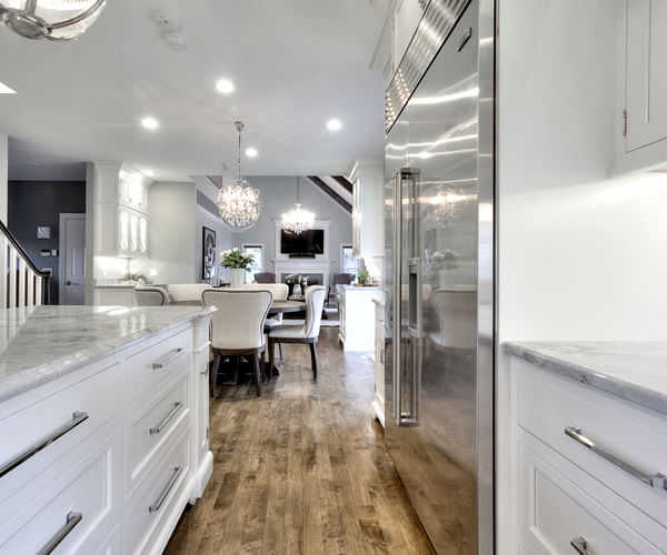 Cabinetry by SM Hall - Traditional Style Kitchen and Bath -Traditional Style, Transitional Style, White Cabinets, Glamorous, curved mullions, custom mosaic tile backsplash, custom hidden storage cabinets